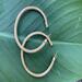 Golden grass large hoop earrings with gold plated ear posts.